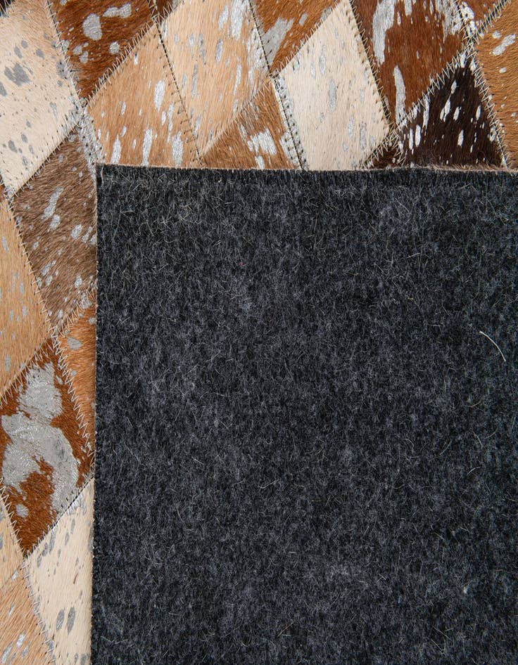 Detail image of  5' 3 x 7' 6 Cowhide Stocks Rug