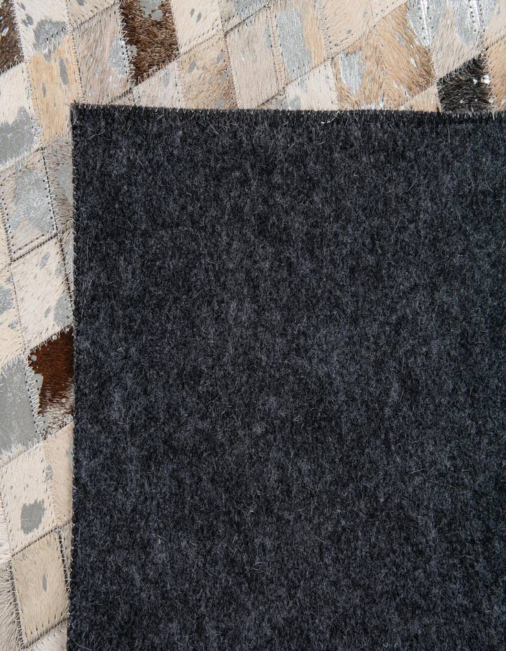 Detail image of  5' 1 x 7' 11 Cowhide Stocks Rug