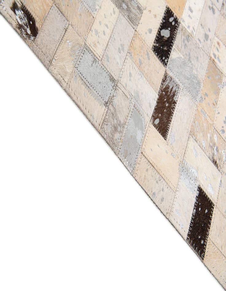 Detail image of  5' 3 x 7' 5 Cowhide Stocks Rug