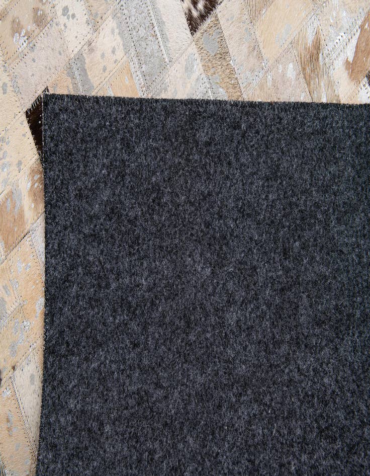 Detail image of  5' 3 x 7' 5 Cowhide Stocks Rug