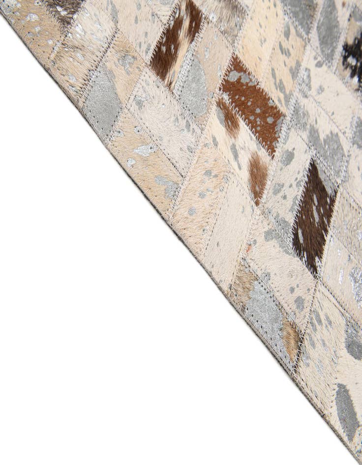 Detail image of  5' x 7' 6 Cowhide Stocks Rug