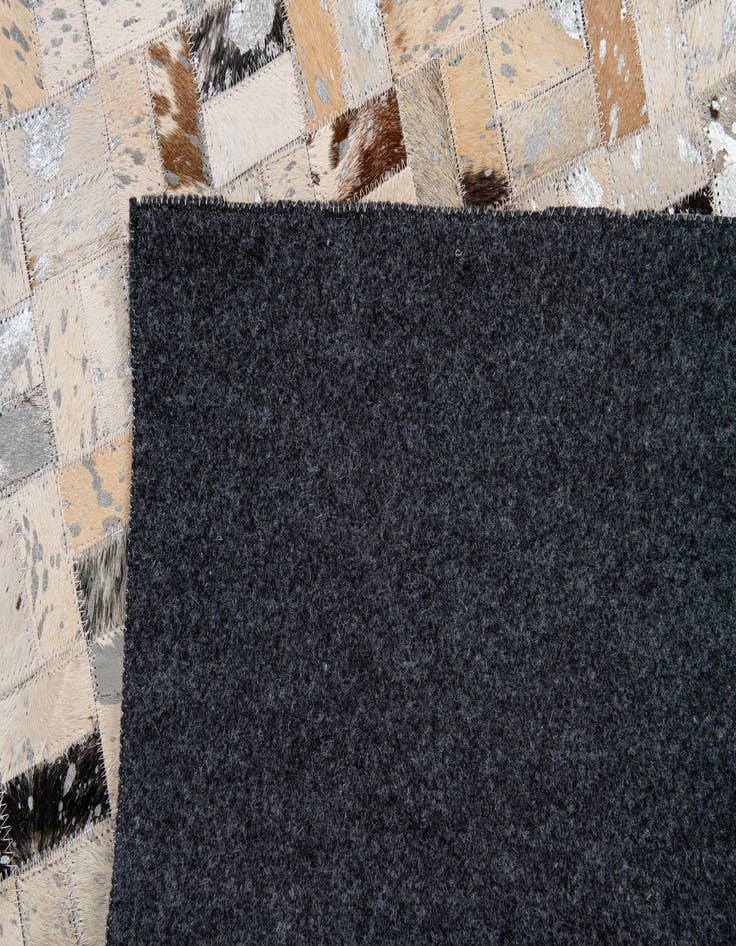Detail image of  5' x 7' 6 Cowhide Stocks Rug