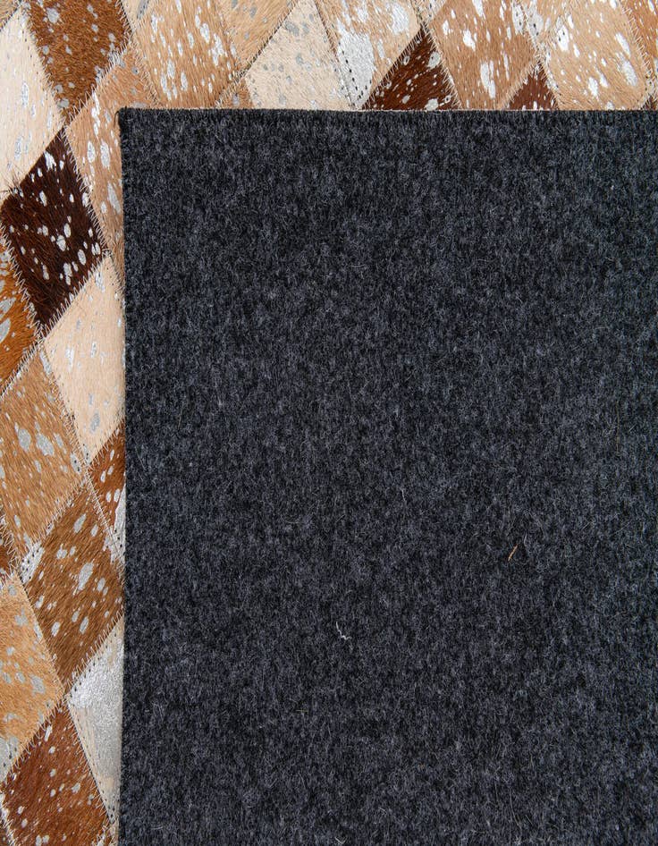 Detail image of  5' 3 x 7' 6 Cowhide Stocks Rug