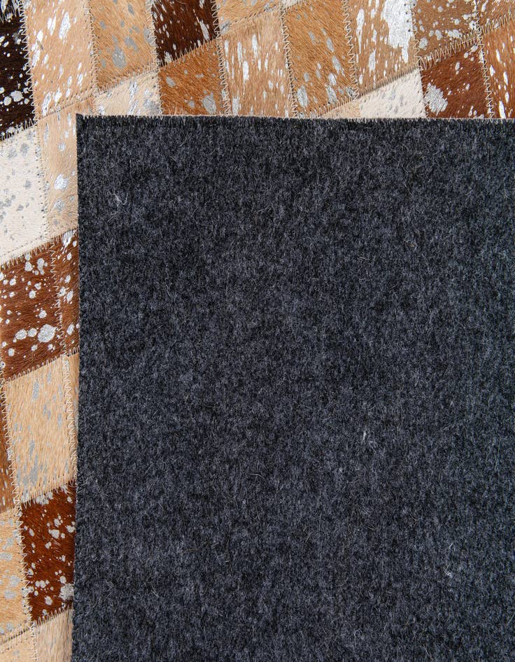 Detail image of  5' 2 x 7' 6 Cowhide Stocks Rug