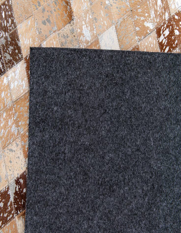 Detail image of  5' 3 x 7' 7 Cowhide Stocks Rug