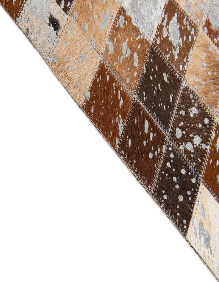 Detail image of  5' 3 x 7' 6 Cowhide Stocks Rug