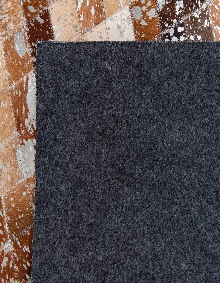 Detail image of  5' 3 x 7' 6 Cowhide Stocks Rug