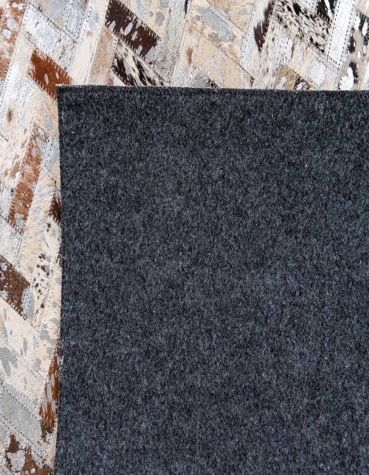 Detail image of  5' 3 x 7' 5 Cowhide Stocks Rug