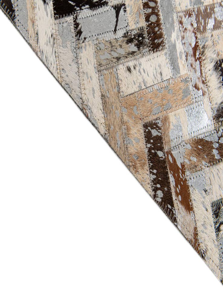 Detail image of  5' 3 x 7' 8 Cowhide Stocks Rug