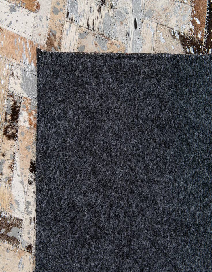 Detail image of  5' 3 x 7' 8 Cowhide Stocks Rug