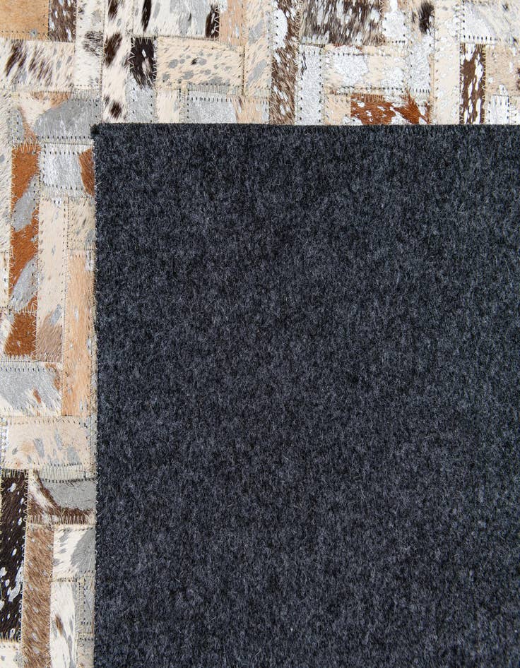 Detail image of  5' 4 x 7' 7 Cowhide Stocks Rug