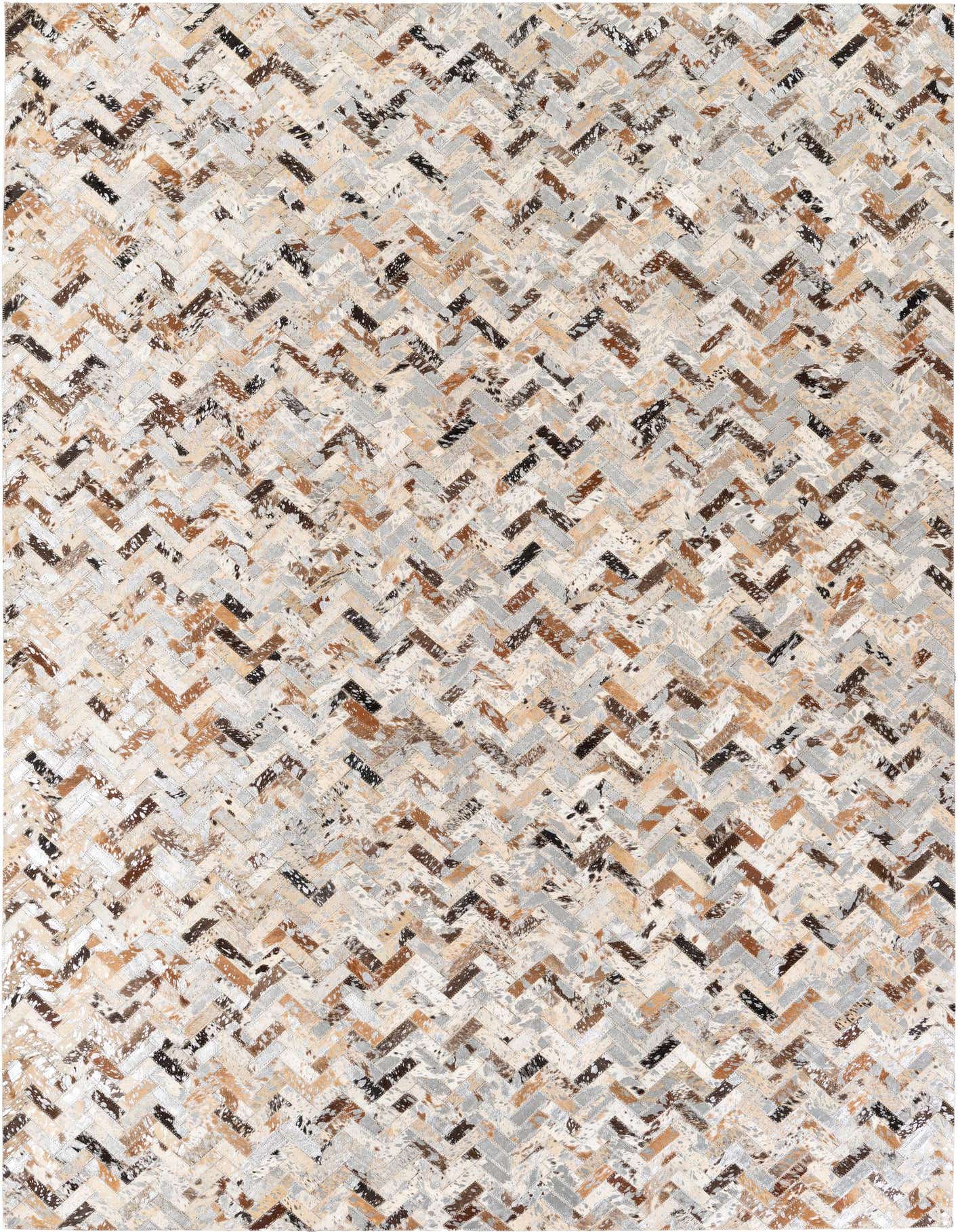 A 5x8 rectangular Cowhide Stocks rug from Rugs.com, featuring a modern multi-colored chevron pattern of natural cowhide patches in shades of brown, black, white, and grey.