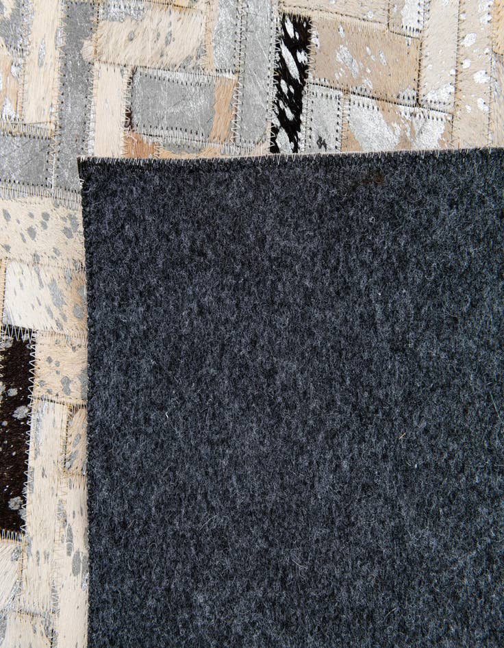 Detail image of  5' 4 x 7' 4 Cowhide Stocks Rug