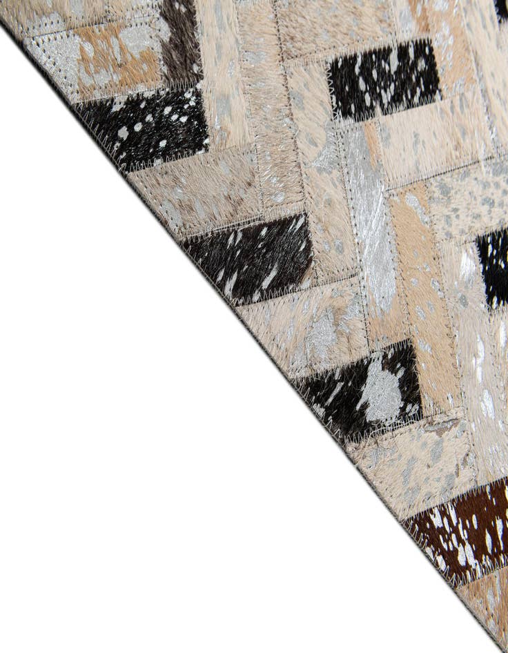 Detail image of  5' 3 x 7' 3 Cowhide Stocks Rug