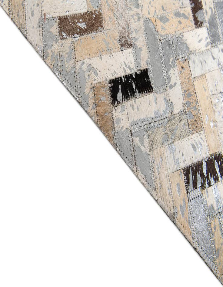 Detail image of  5' 3 x 7' 6 Cowhide Stocks Rug