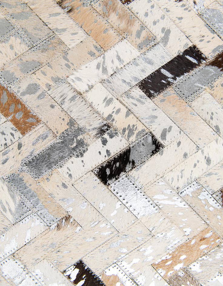 Detail image of  5' 3 x 7' 6 Cowhide Stocks Rug
