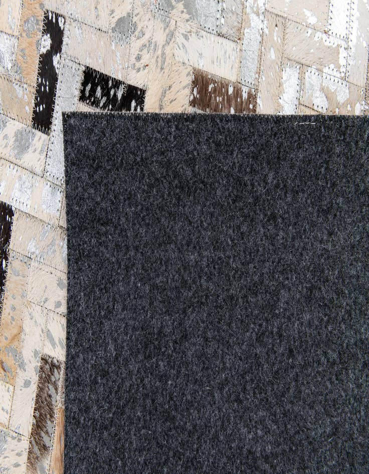 Detail image of  5' 3 x 7' 6 Cowhide Stocks Rug