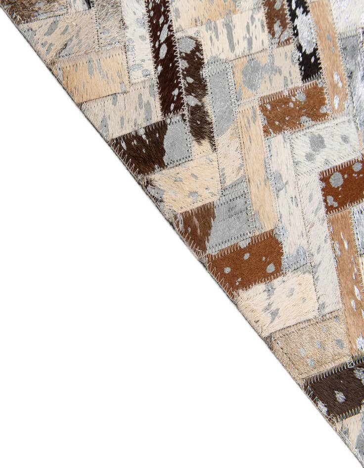 Detail image of  5' 3 x 7' 5 Cowhide Stocks Rug