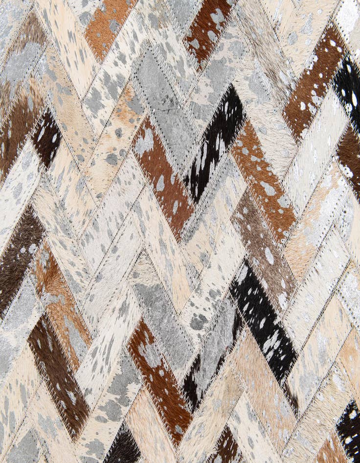 Detail image of  5' 3 x 7' 5 Cowhide Stocks Rug