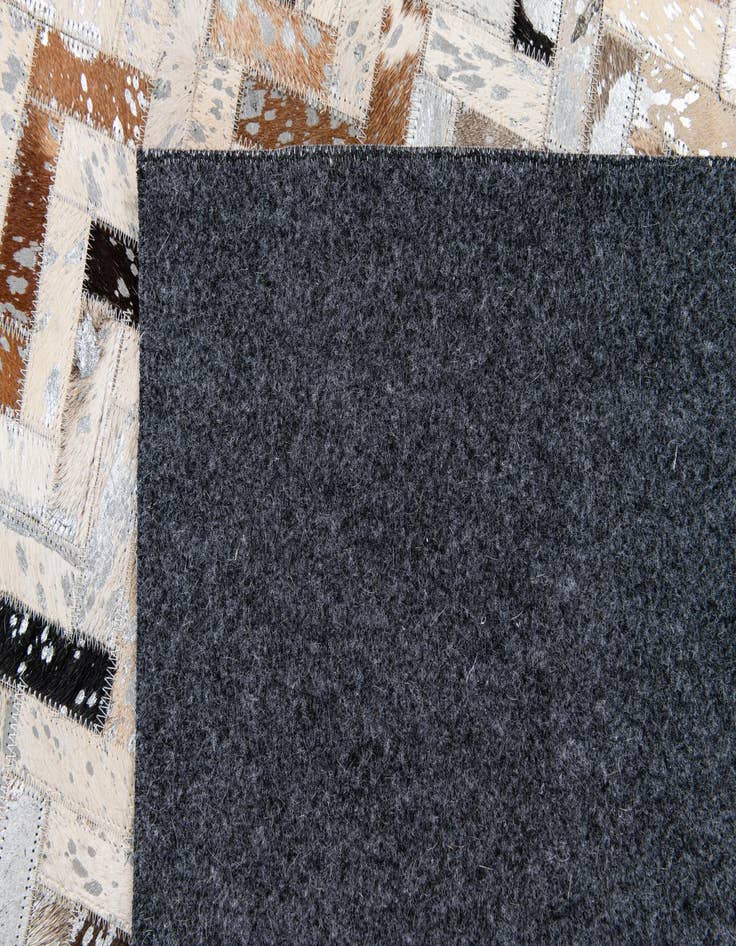 Detail image of  5' 3 x 7' 5 Cowhide Stocks Rug