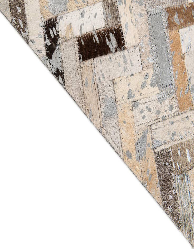 Detail image of  5' 2 x 7' 5 Cowhide Stocks Rug