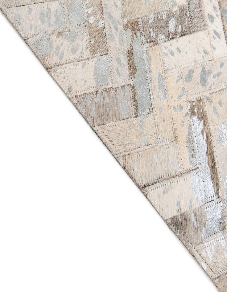 Detail image of  5' 4 x 7' 7 Cowhide Stocks Rug