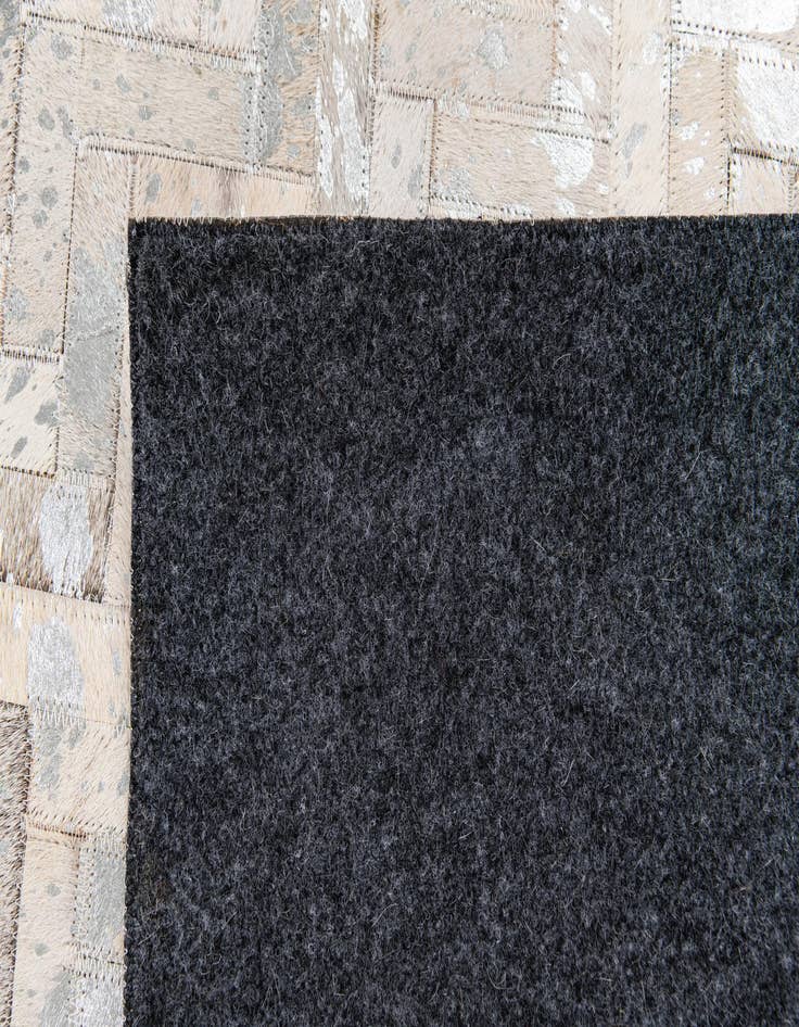 Detail image of  5' 4 x 7' 7 Cowhide Stocks Rug