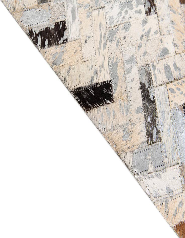 Detail image of  5' 4 x 7' 6 Cowhide Stocks Rug