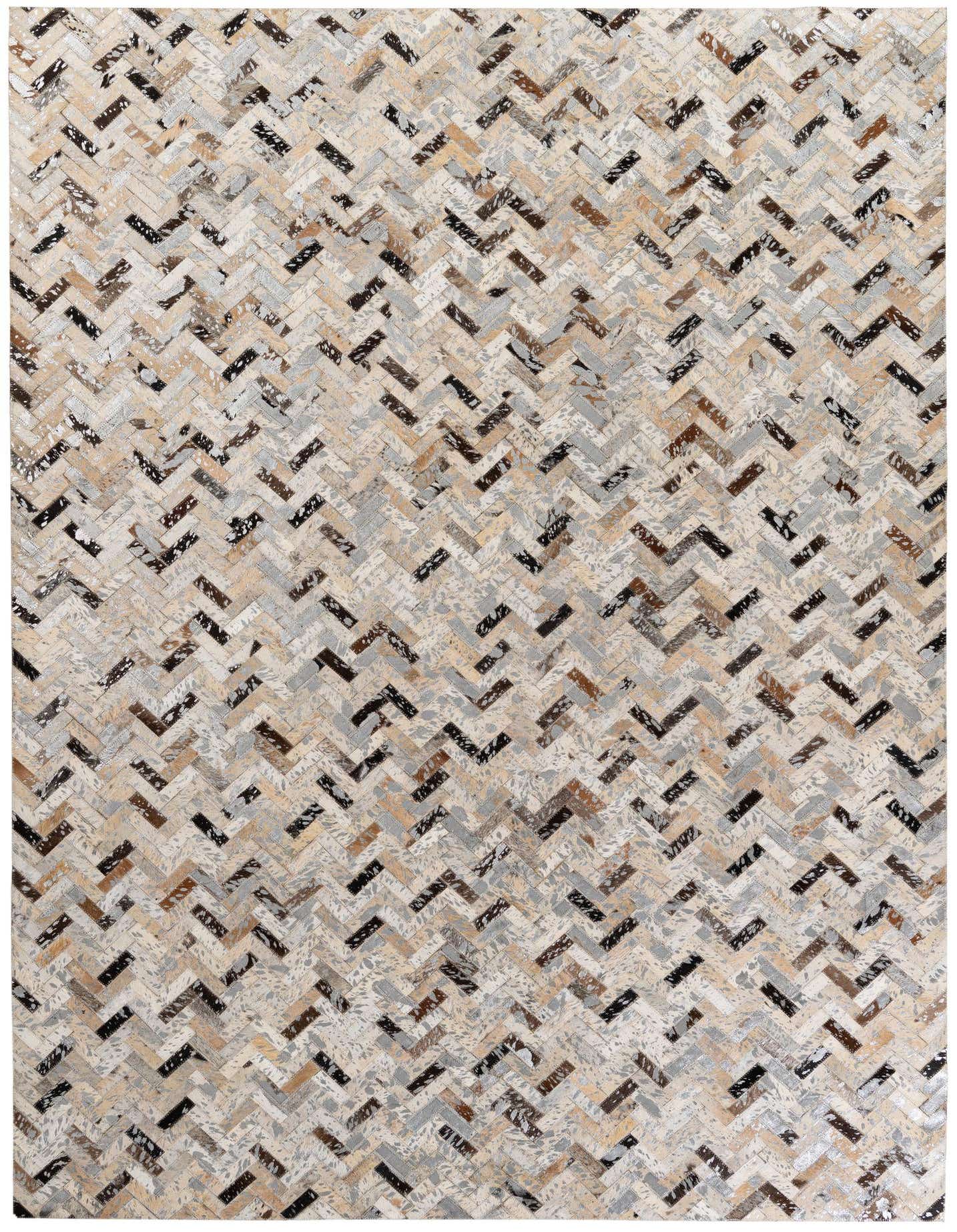 A 5x8 rectangular Cowhide Stocks rug from Rugs.com, featuring a modern multi-colored herringbone pattern in shades of brown, black, and cream.