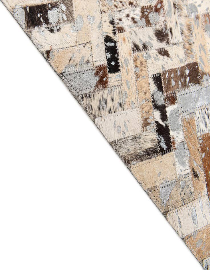 Detail image of  5' 3 x 7' 5 Cowhide Stocks Rug