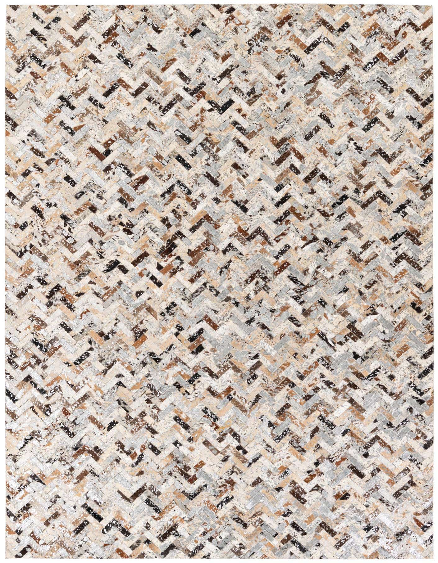 A rectangular 5x8 modern cowhide rug featuring a multi-colored chevron pattern in shades of brown, black, beige, and gray.
