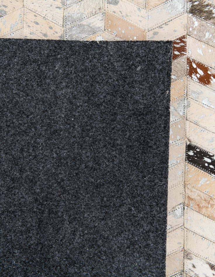 Detail image of  5' 4 x 7' 7 Cowhide Stocks Rug