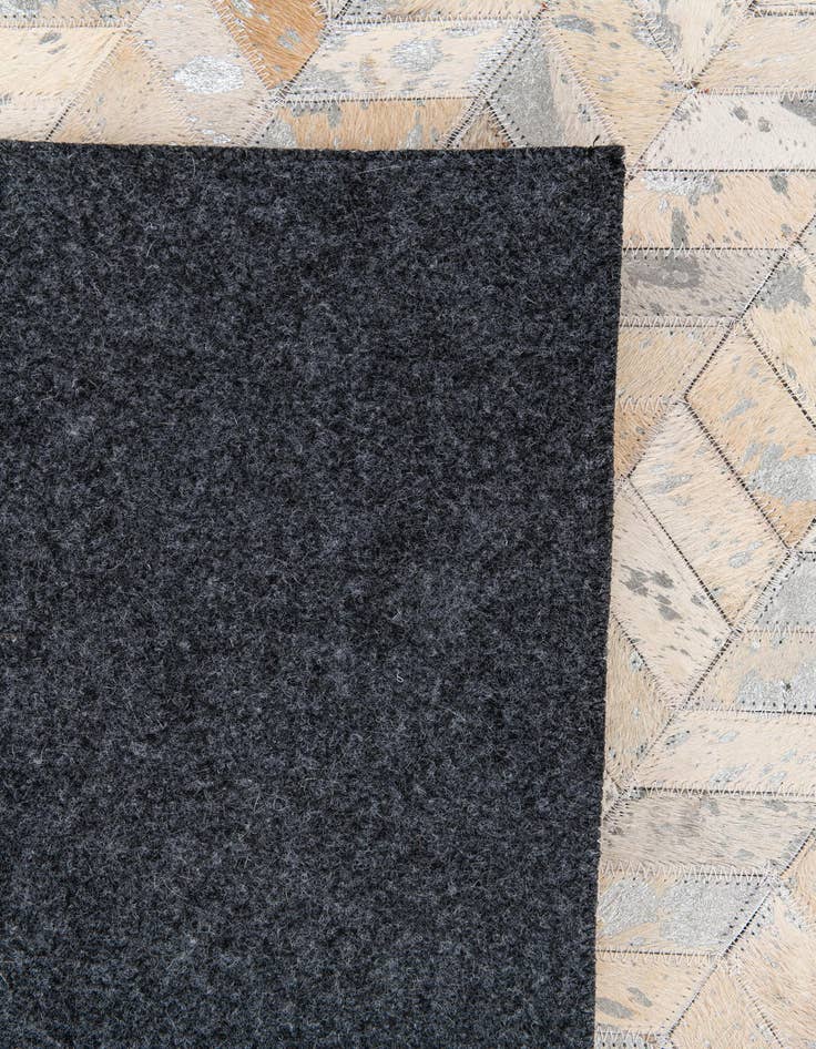 Detail image of  5' 4 x 7' 7 Cowhide Stocks Rug