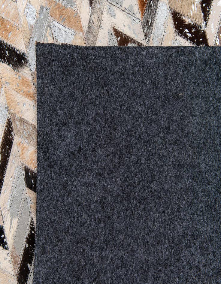 Detail image of  5' 4 x 7' 6 Cowhide Stocks Rug