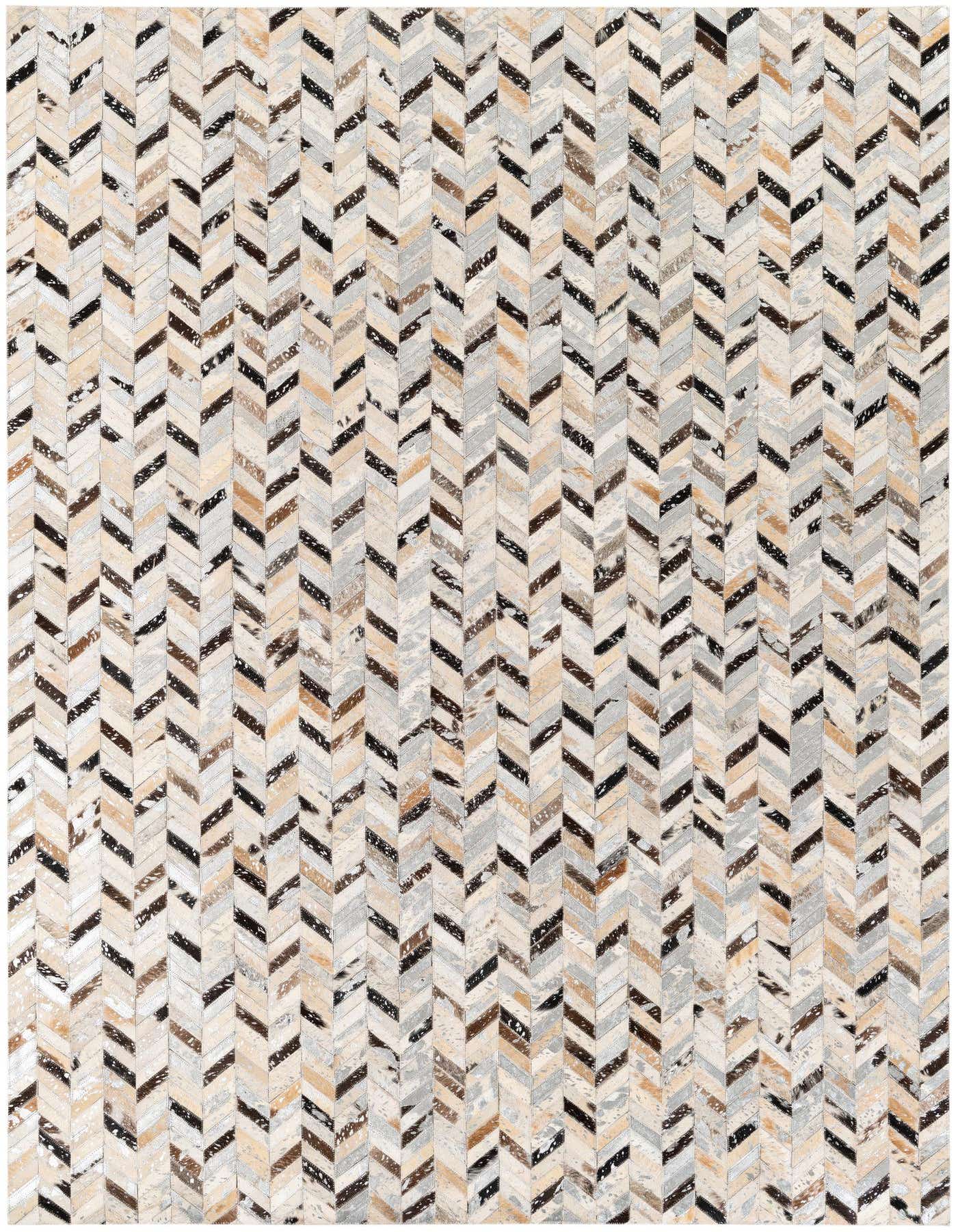 A 5x8 rectangular Cowhide Stocks rug by Rugs.com, featuring a modern multi-colored chevron pattern in natural hide tones.
