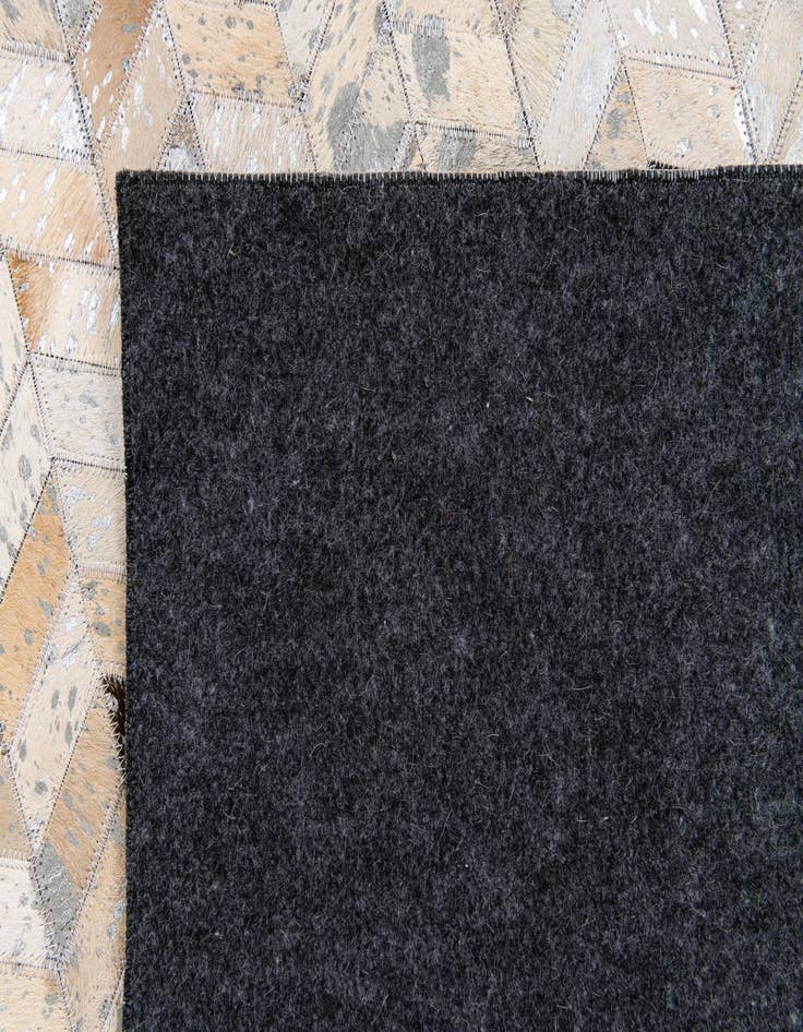 Detail image of  5' 4 x 7' 7 Cowhide Stocks Rug