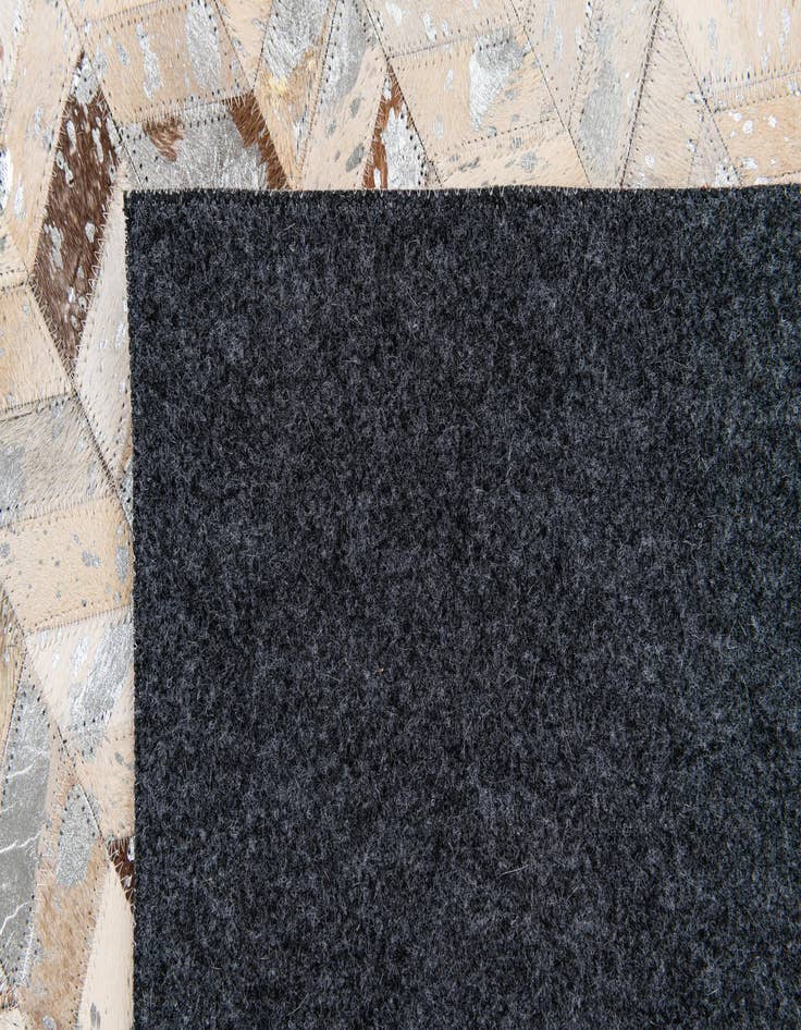 Detail image of  5' 4 x 7' 6 Cowhide Stocks Rug