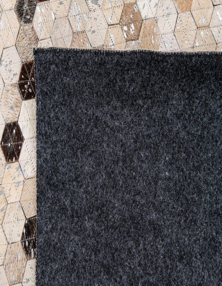 Detail image of  5' 6 x 7' 7 Cowhide Stocks Rug