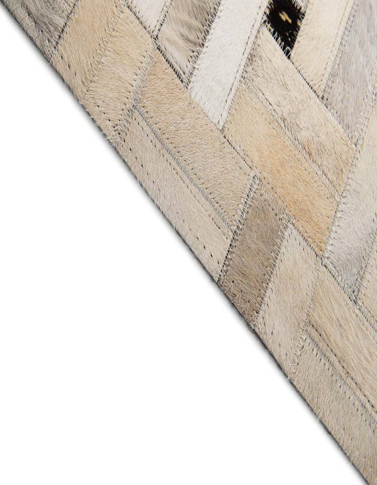 Detail image of  5' 1 x 7' 11 Cowhide Stocks Rug