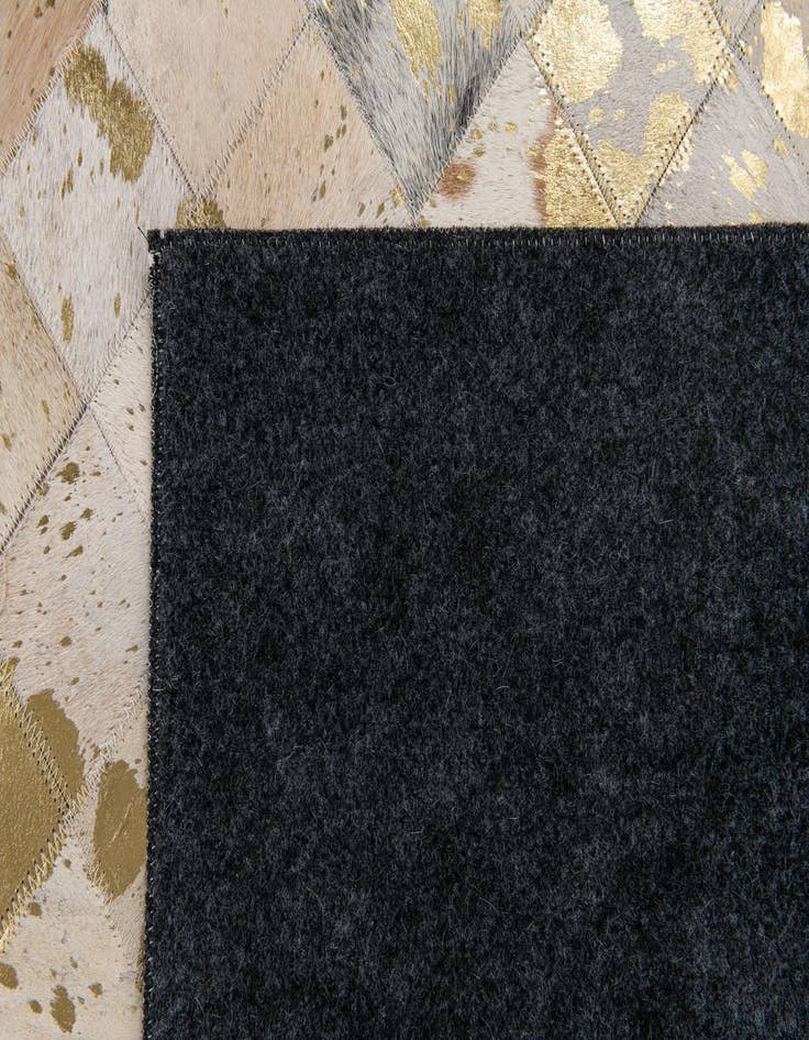 Detail image of  5' 2 x 8' 1 Cowhide Stocks Rug