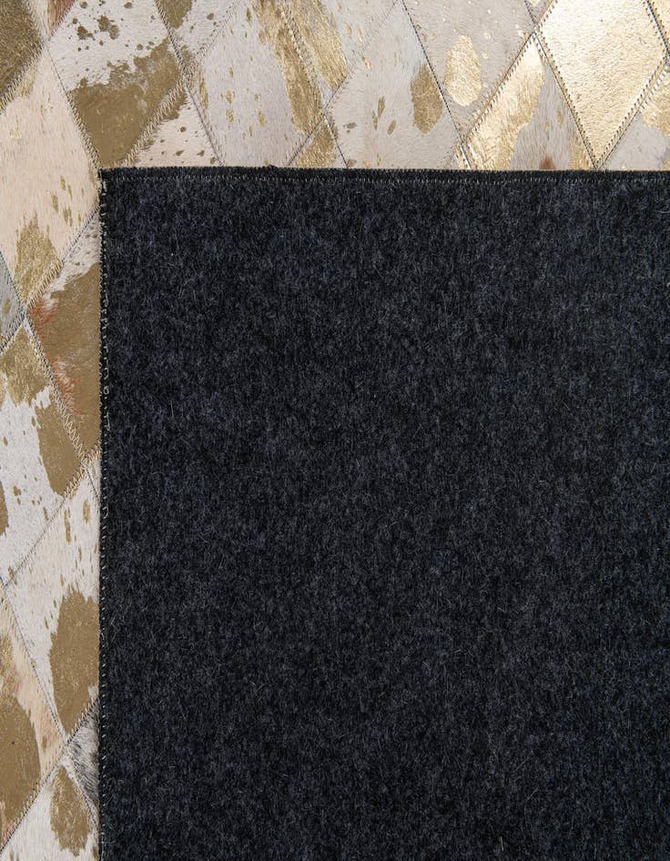 Detail image of  5' 2 x 7' 11 Cowhide Stocks Rug