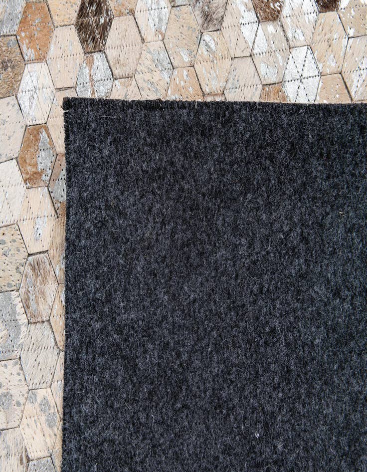 Detail image of  5' 4 x 7' 6 Cowhide Stocks Rug