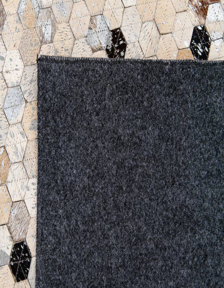 Detail image of  5' 4 x 7' 6 Cowhide Stocks Rug