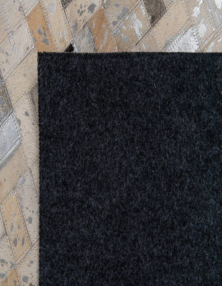 Detail image of  5' 3 x 7' 6 Cowhide Stocks Rug