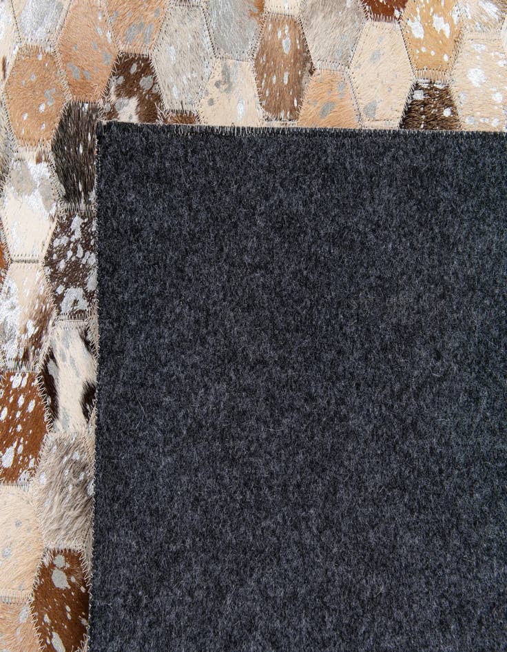 Detail image of  5' 5 x 7' 6 Cowhide Stocks Rug