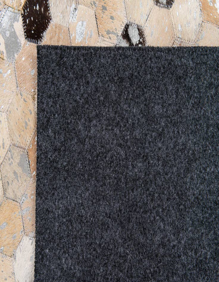 Detail image of  5' 2 x 7' 5 Cowhide Stocks Rug