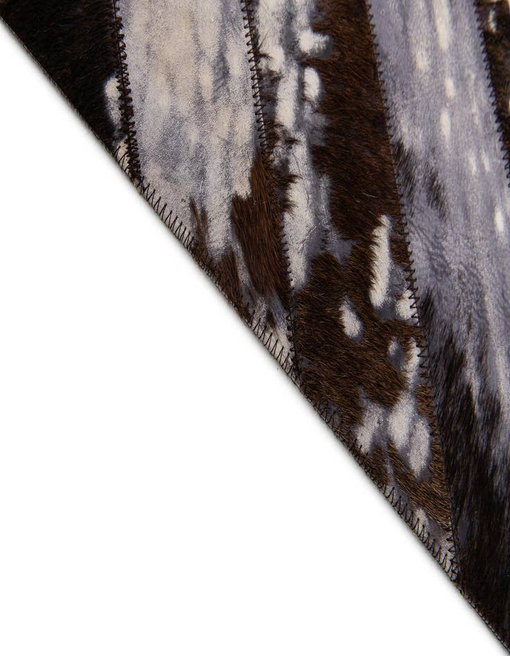 Detail image of  5' 1 x 8' Cowhide Stocks Rug