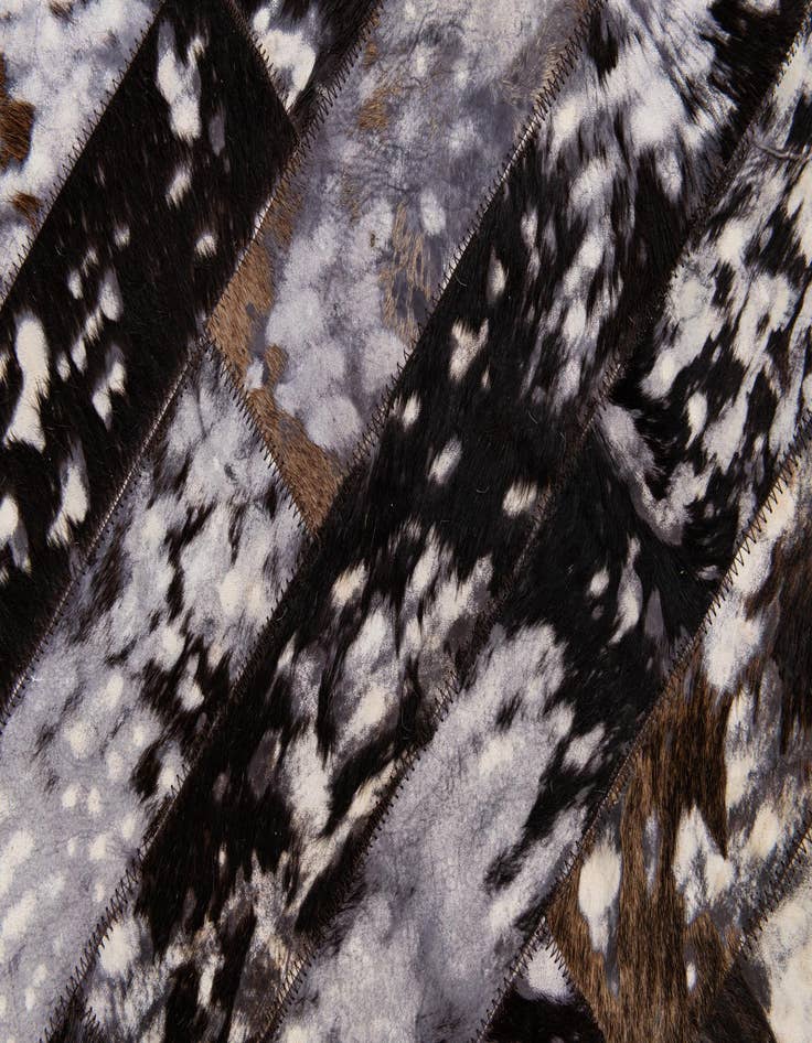 Detail image of  5' 1 x 8' Cowhide Stocks Rug