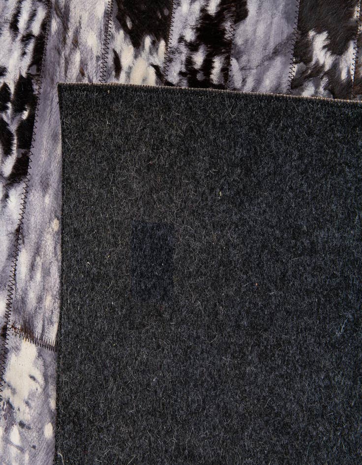 Detail image of  5' 1 x 8' Cowhide Stocks Rug