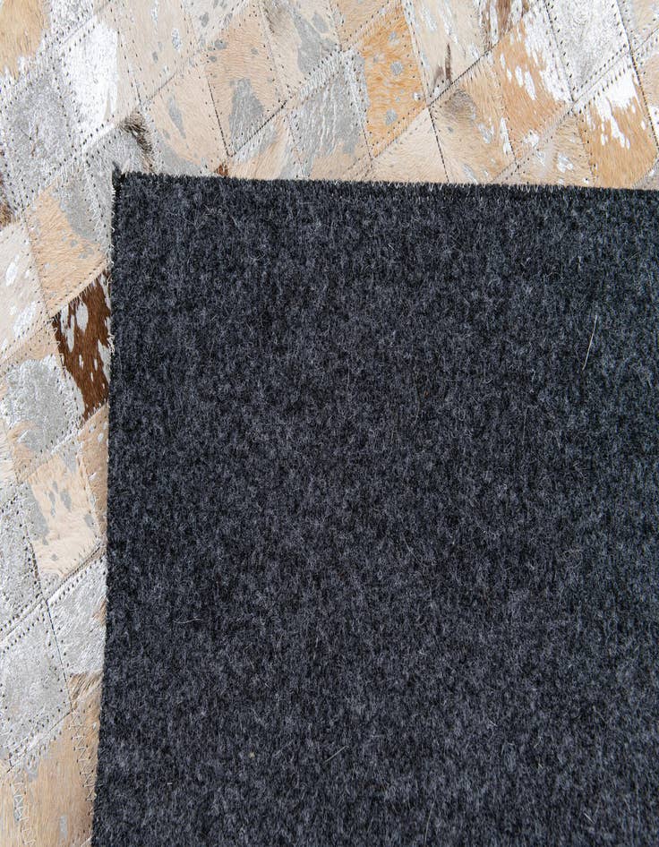 Detail image of  5' 5 x 7' 8 Cowhide Stocks Rug